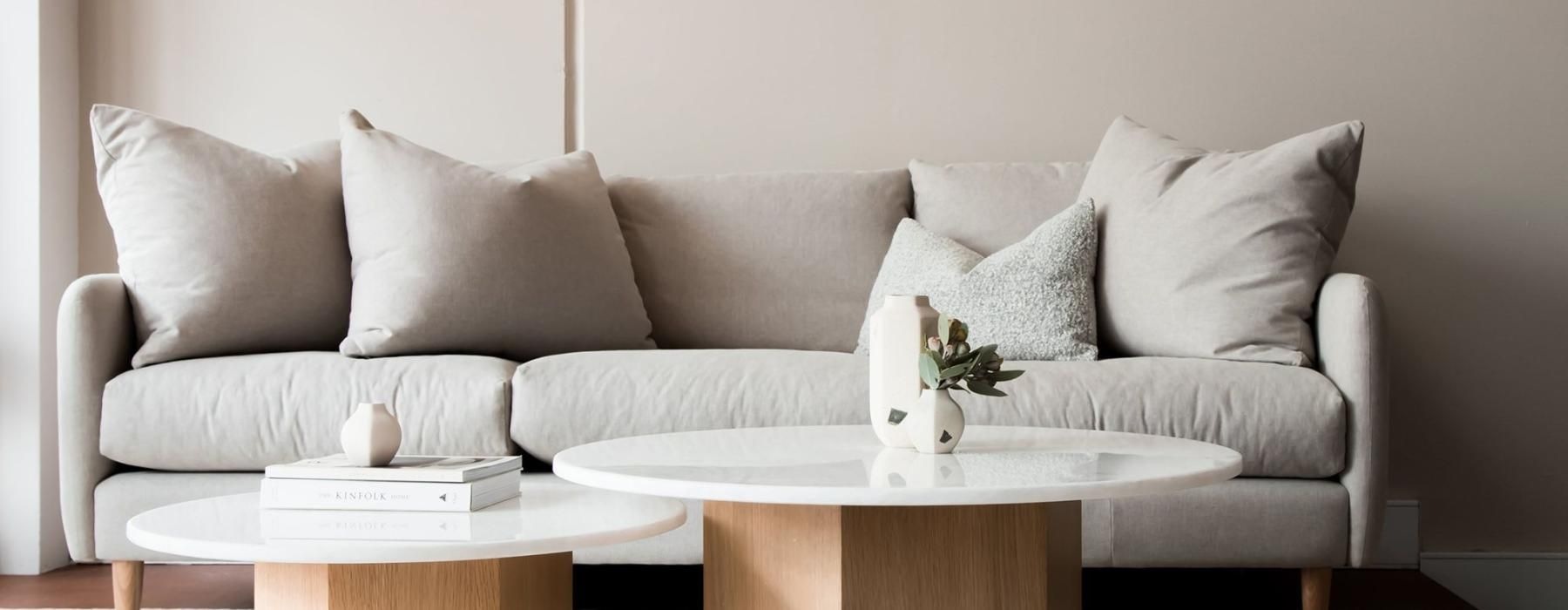 a white couch with a coffee table