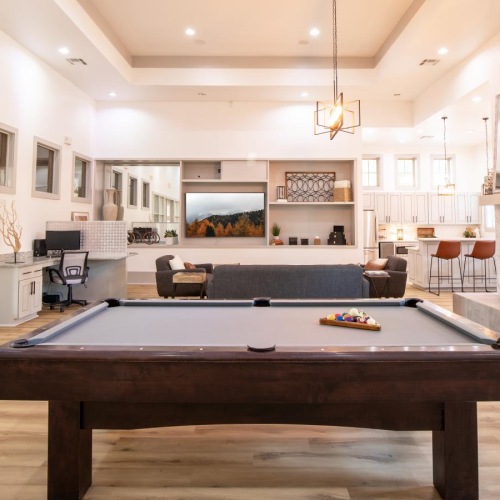 Find your perfect fit at Villas at Wylie a large room with a pool table and chairs